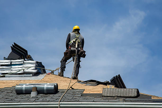 Professional Gutter Installation technician working in Bat Cave, NC